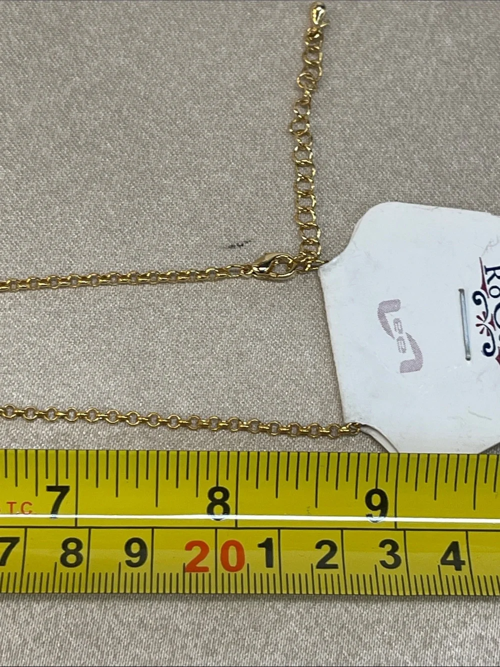Gold-Tone Necklace with Beige Center and Green Crystal Halo